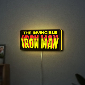 Iron Man Comic Style LED lightbox hanging on a wall with yellow glow