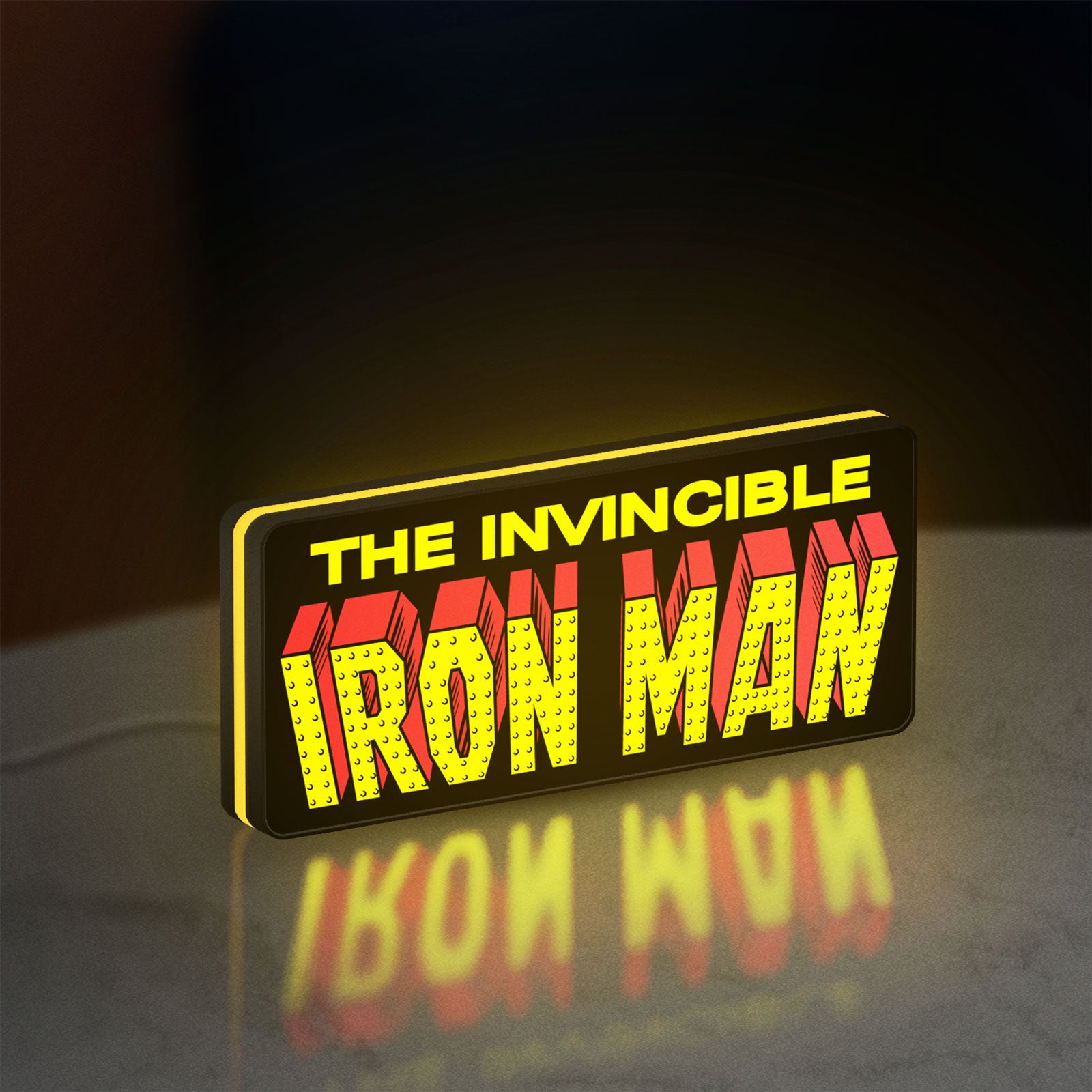 Iron Man Comic Style LED lightbox standing on a desk from an angled side view with yellow glow