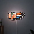 G.I. Joe LED lightbox hanging on a wall with white glow