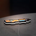 G.I. Joe LED lightbox lying flat on a desk with white glow