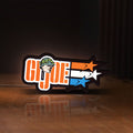 Front view of G.I. Joe LED lightbox sign glowing on a wooden desk