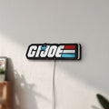 Unlit G.I. Joe LED lightbox mounted on a wall in daylight