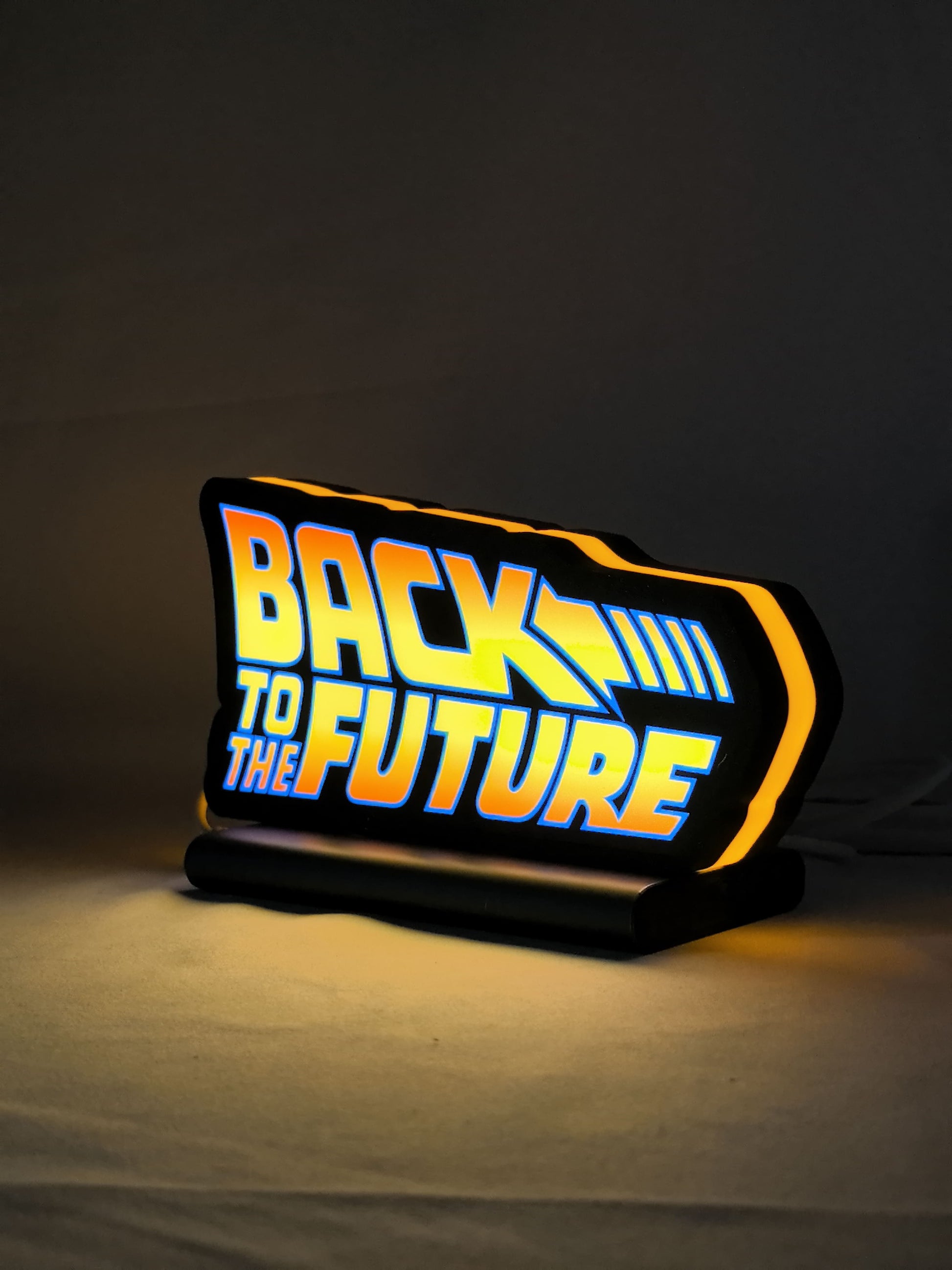 20cm Back To The Future Delorean Glowing Wall Art - Illuminated angled view standing, unique wall art for desk and room decor
