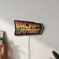 Unlit Back to the Future DeLorean LED lightbox mounted on a wall in daylight