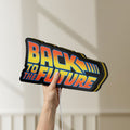 Unlit Back to the Future DeLorean LED lightbox held by hand to show size and details