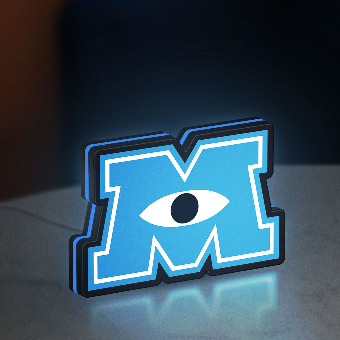 Monsters University LED lightbox hanging on a wall with blue glow