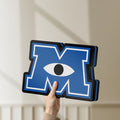 Unlit Monsters University LED lightbox held by hand to show size and details