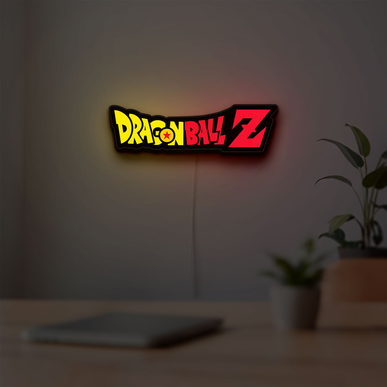 Dragon Ball Z LED lightbox hanging on a room wall with soft yellow light