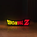 Front view of Dragon Ball Z LED lightbox sign glowing on a wooden desk