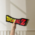 Unlit Dragon Ball Z LED lightbox held by hand to show size and details
