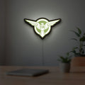 Captain America SSR LED lightbox hanging on a room wall with soft green light