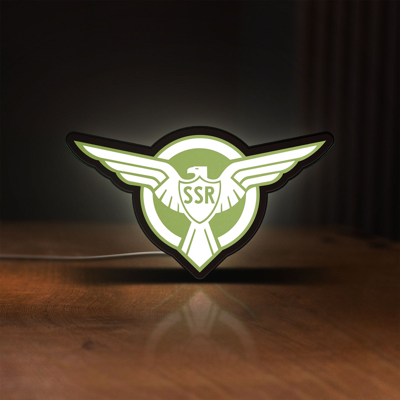 Front view of Captain America SSR LED lightbox sign glowing on a wooden desk