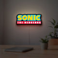 Sonic the Hedgehog LED lightbox hanging on a room wall with soft white light