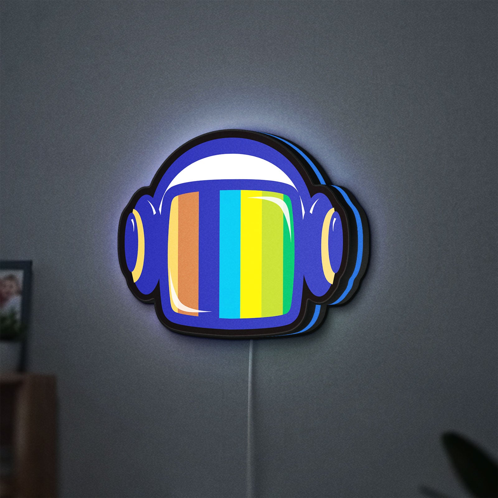 Retro Broadcast LED lightbox hanging on a wall with blue glow