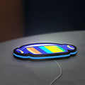 Retro Broadcast LED lightbox lying flat on a desk with blue glow