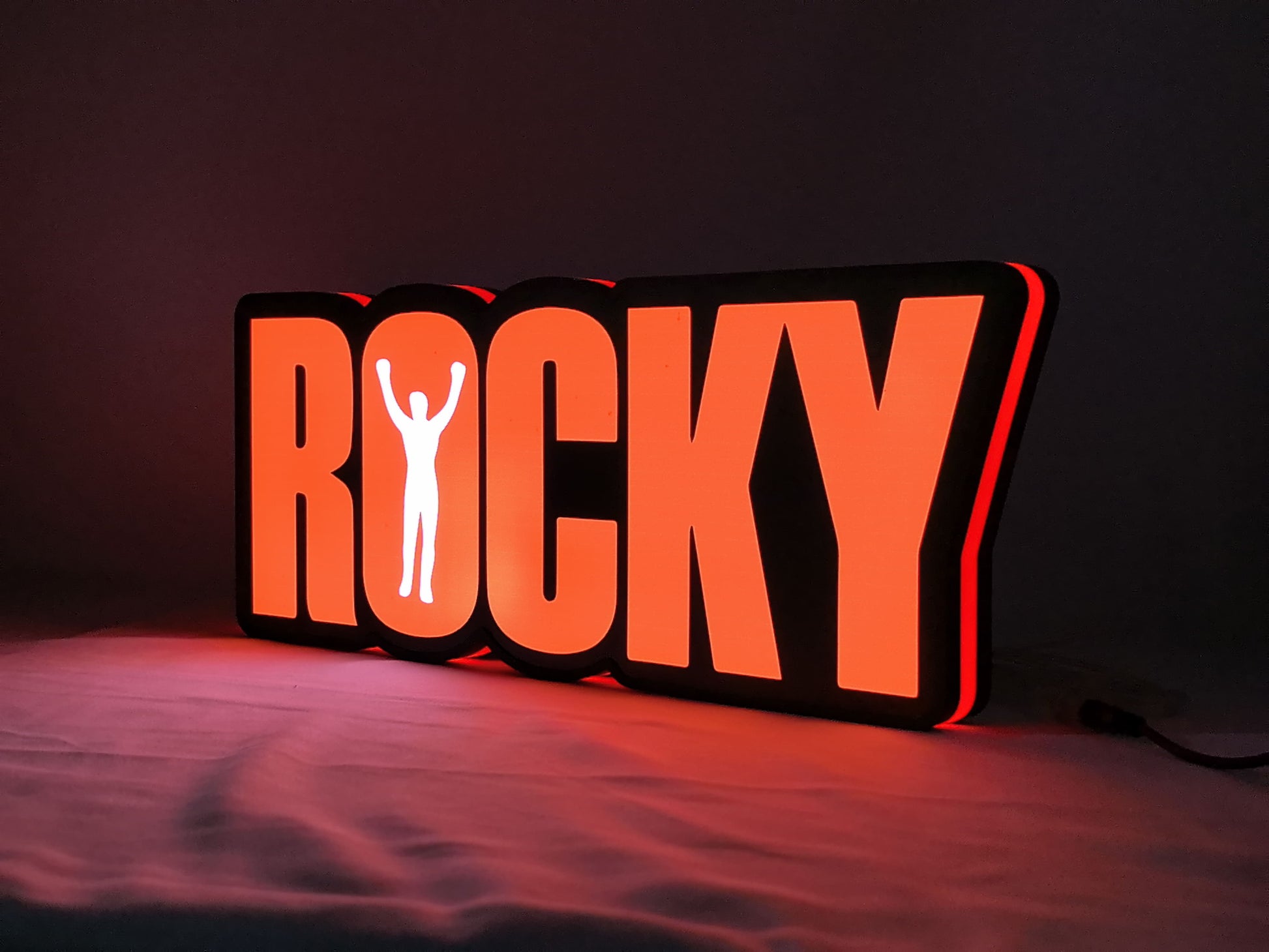 Illuminated angled view standing of Rocky Balboa 3D LED Sign in 40cm, perfect for music studio and bedroom decor