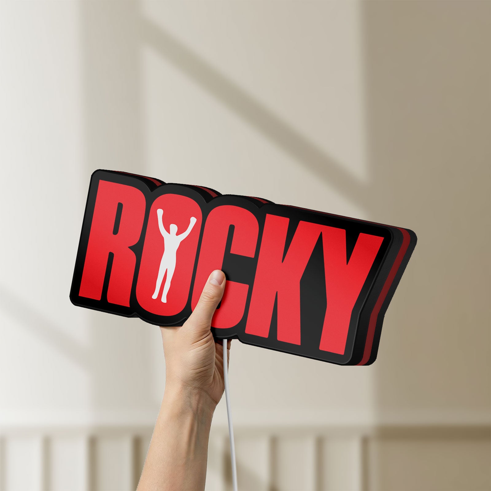 Unlit Rocky Balboa LED lightbox held by hand to show size and details