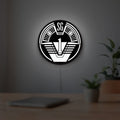 SG-1 Patch Lightbox LED lightbox hanging on a room wall with soft white light