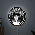 SG-1 Patch Lightbox LED lightbox hanging on a wall with white glow
