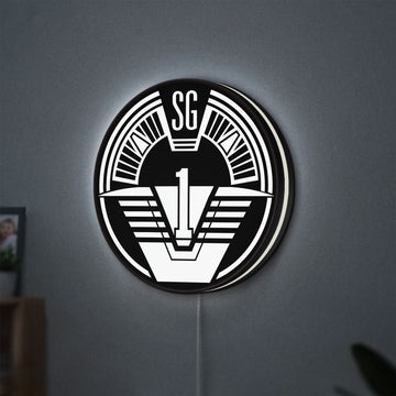SG-1 Patch Lightbox LED lightbox hanging on a wall with white glow