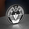 SG-1 Patch Lightbox LED lightbox standing on a desk from an angled side view with white glow