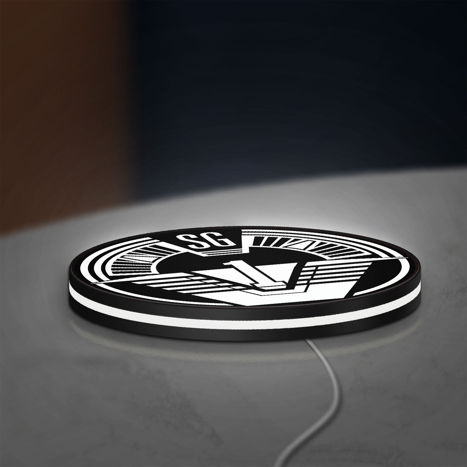 SG-1 Patch Lightbox LED lightbox lying flat on a desk with white glow