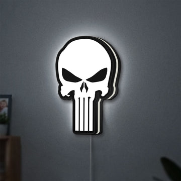 Punisher Skull LED lightbox hanging on a wall with white glow