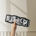 Unlit Avengers LED lightbox held by hand to show size and details