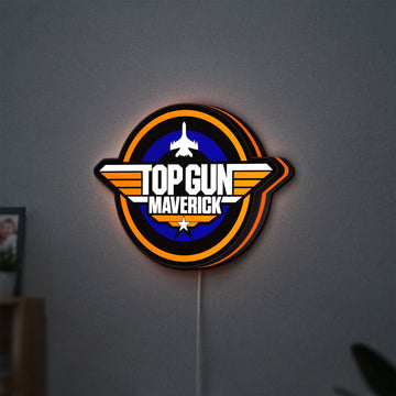 Top Gun Maverick LED lightbox hanging on a wall with orange glow
