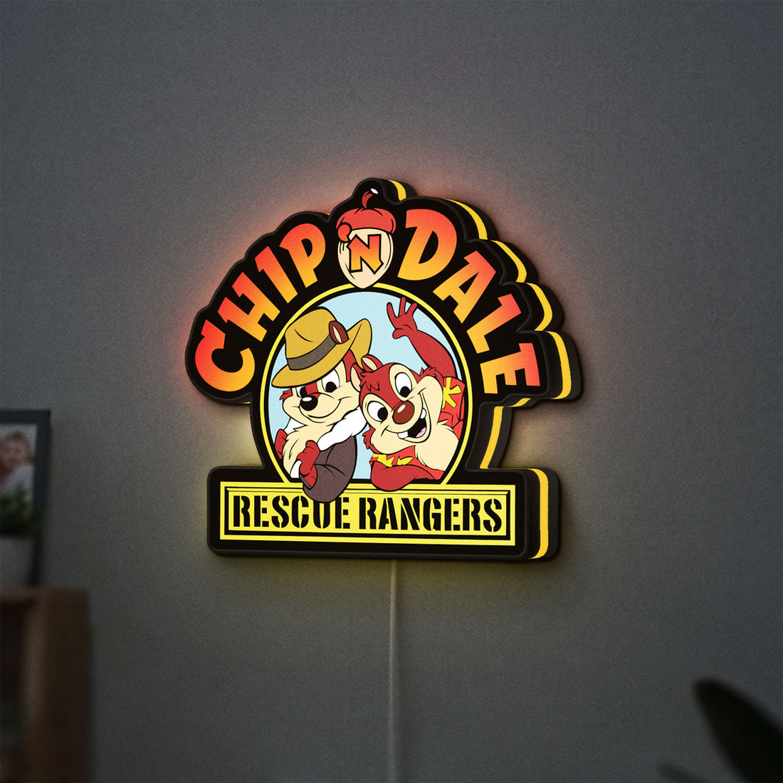 Chip n Dale Rescue Rangers LED lightbox hanging on a wall with yellow glow