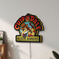 Unlit Chip n Dale Rescue Rangers LED lightbox mounted on a wall in daylight