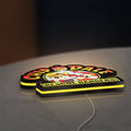 Chip n Dale Rescue Rangers LED lightbox lying flat on a desk with yellow glow