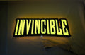 40cm Invincible 3D Printed Sign - Illuminated flat lay front view, cool game room and bedroom decor