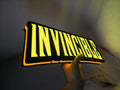 Invincible LED Sign (40cm) - Illuminated handheld size reference, cool game room and bedroom decor