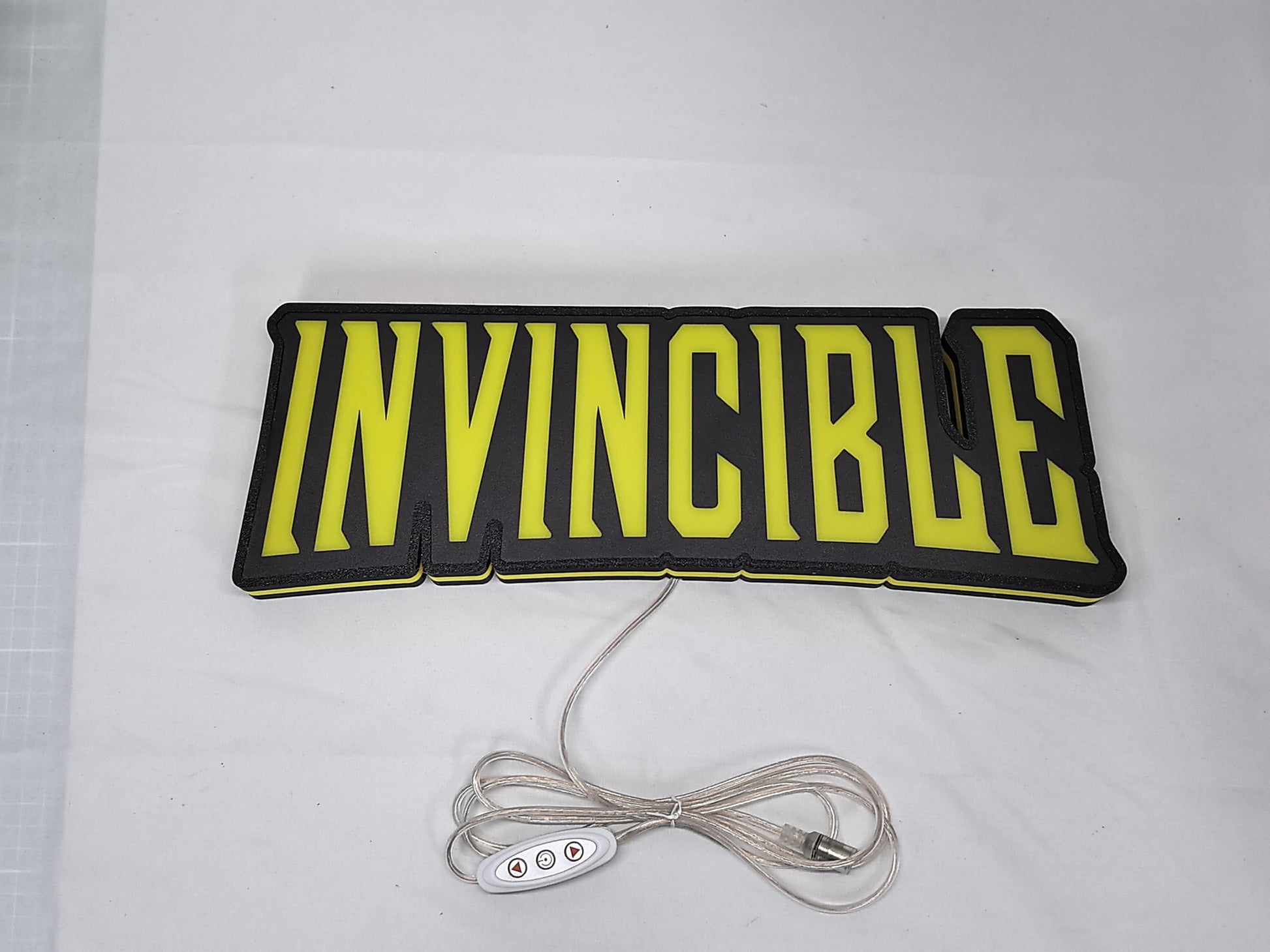 Invincible LED Light Box (40cm) - Unlit flat lay front details, cool game room and bedroom decor