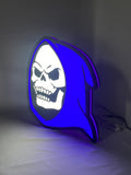 40cm Skeletor Glowing Wall Art - Illuminated angled view standing, unique wall art for desk and room decor