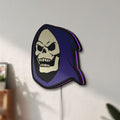 Unlit Skeletor LED lightbox mounted on a wall in daylight