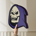 Unlit Skeletor LED lightbox held by hand to show size and details