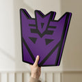 Unlit Decepticon LED lightbox held by hand to show size and details