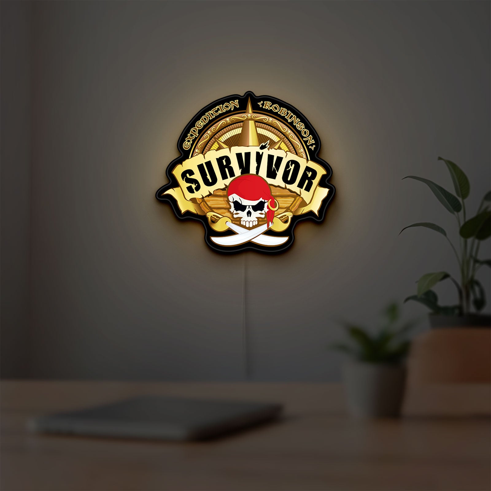 Expedition Robinson Survivor LED lightbox hanging on a room wall with soft yellow light