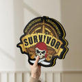 Unlit Expedition Robinson Survivor LED lightbox held by hand to show size and details