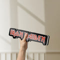 Unlit Iron Maiden LED lightbox held by hand to show size and details