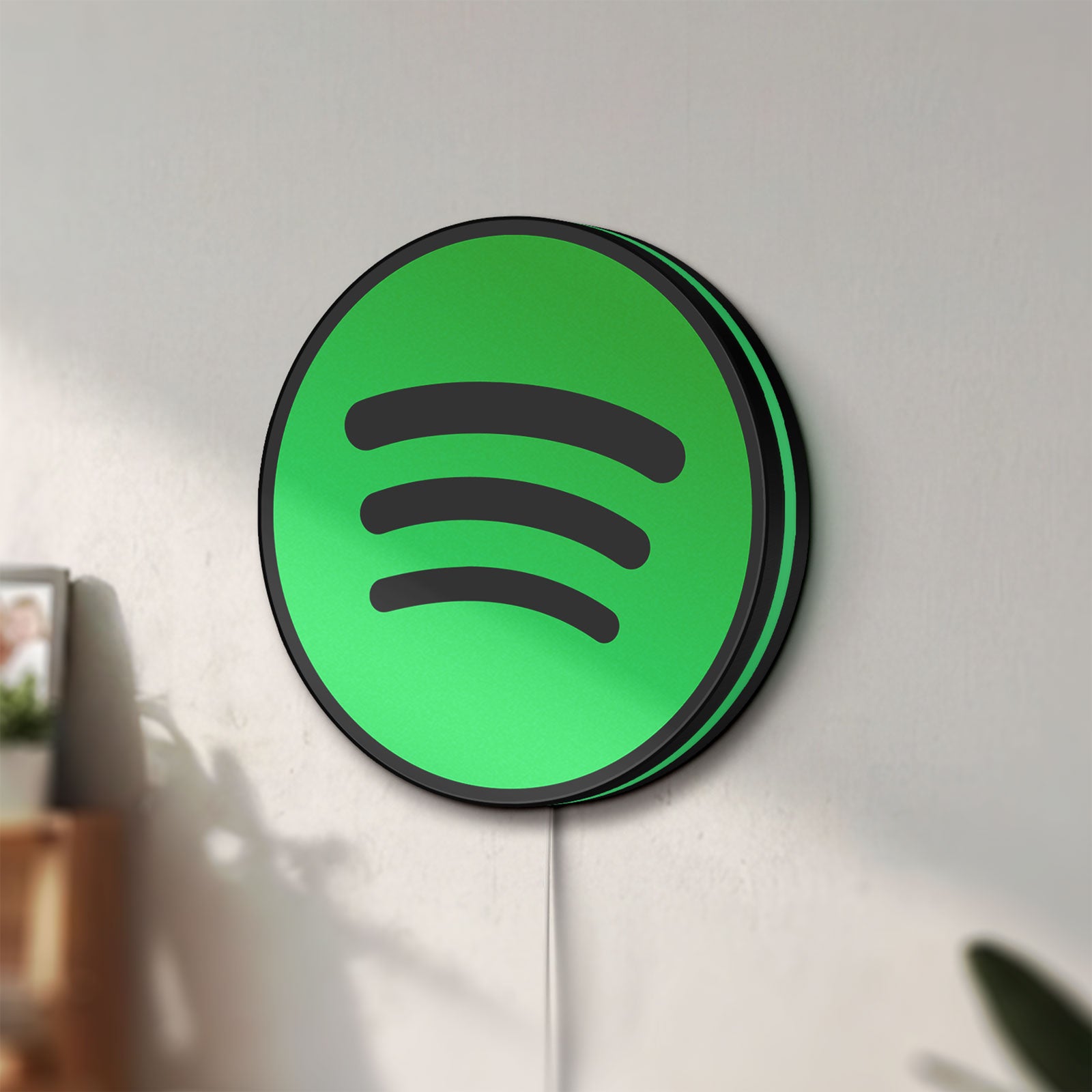 Unlit Spotify 2015 LED lightbox mounted on a wall in daylight