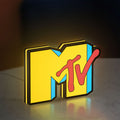 MTV Music Television LED lightbox standing on a desk from an angled side view with yellow glow
