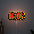 AC DC Red LED lightbox hanging on a wall with yellow glow