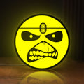Front view of Iron Maiden Eddie LED lightbox sign glowing on a wooden desk