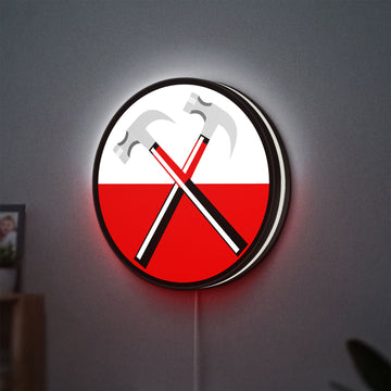 Pink Floyd Hammers LED lightbox hanging on a wall with white glow