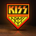 Front view of Kiss Army LED lightbox sign glowing on a wooden desk