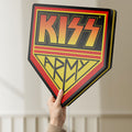Unlit Kiss Army LED lightbox held by hand to show size and details