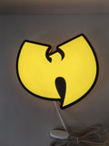 Illuminated flat lay front view of Wu Tang Illuminated Sign in 40cm, unique wall art for desk and room decor